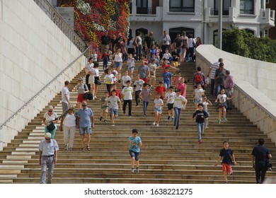 BILBAO, SPAIN - June 2 2018: Children Running Down The Stairs