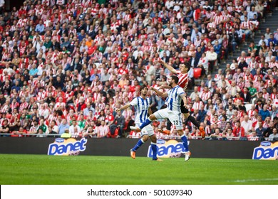 BILBAO, SPAIN - OCTOBER 16: Carlos Martinez, Raul Navas And Aritz Aduriz During The Spanish League Match Between Athletic Bilbao And Real Sociedad, Celebrated On October 16, 2016 In Bilbao, Spain