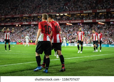 BILBAO, SPAIN - SEPTEMBER 15, 2018: Iker Munian and Dani Garcia, Athletic Club Bilbao players, celebrates a goal during a Spanish League match between Athletic Club Bilbao and Real Madrid