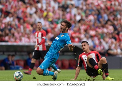 BILBAO, SPAIN. September 28th, 2019. Basque Country. San Mames. Liga Santander. Athletic Bilbao V Valencia CF: Ferrán Recieves A Hard Tackle By Dani García.