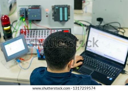 Bilecik, TURKEY - February 15 2019: Operator or Student is taking PLC and SCADA course for Industry 4.0 preparation in a automation education center.