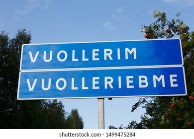 Bilingual Road Sign For The Swedish Village Vuallerim In Swedish And Sami.