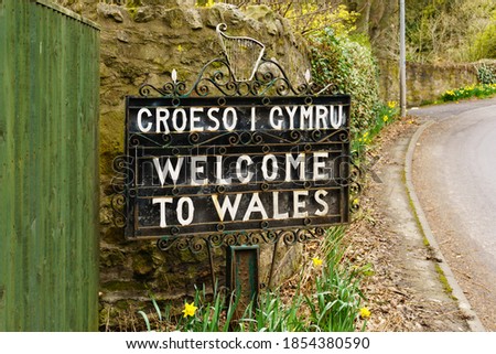 Bilingual Welcome to Wales sign in Welsh and English marking the border between England and Wales on the old coaching route at the town of Chirk UK