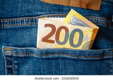 A bill of 200 euros in the pocket of a pair of jeans. Concept about investments, earnings, cash, profits, wealth. Paid under the table. Paid off-books
