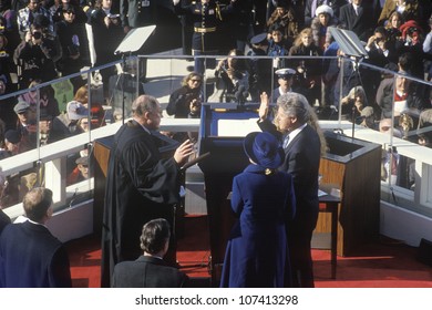 Bill Clinton, 42nd President, Takes The Oath Of Office On Inauguration Day From Chief Justice William Rehnquist On January 20, 1993 In Washington, DC