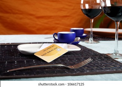 Bill And Credit Card On White Plate At Restaurant