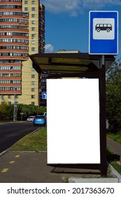 Billboard, Banner, Blank, White At The Bus Stop In The City. Empty Bus Stop On A Clear Summer Day. Copy Space. Ad.