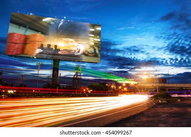 billboard blank for outdoor advertising poster or blank billboard at night time for advertisement. street light.