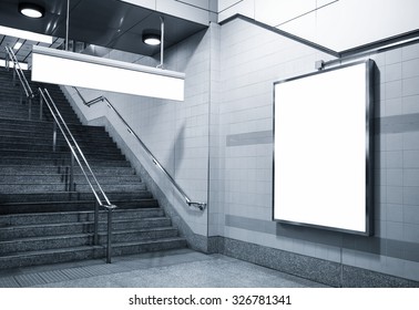 Billboard and direction signage mock up in subway with stairs