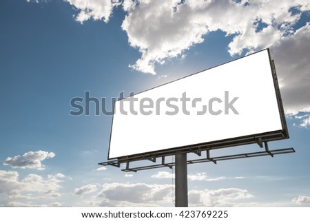Billboard - Empty billboard in front of beautiful cloudy sky in a rural location