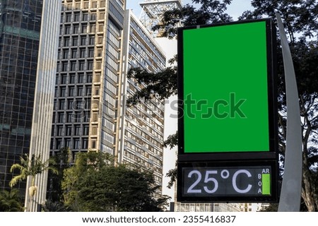 Billboard green chromakey mock up in the city of Sao Paulo. Use this photo day mockup for your outdoor design.