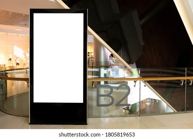 Billboard mock up inside department store. Template of an interior empty stand display, Mock-up of a shopping mall banner placeholder and poster.