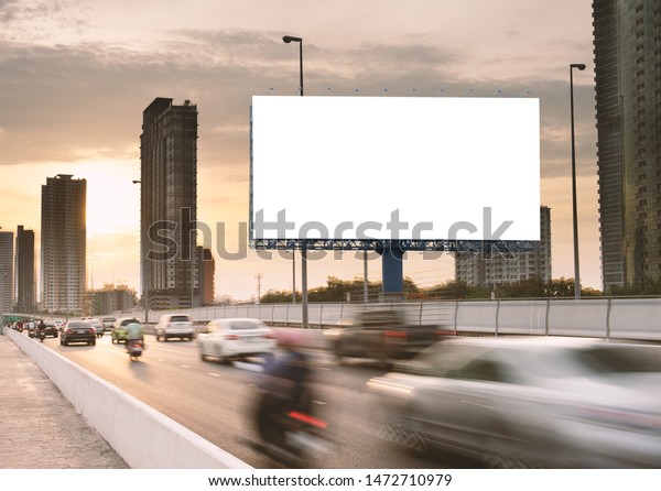 Billboard mockup outdoors, Outdoor advertising\
poster on the street for advertisement street city. With clipping\
path on screen