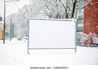 Billboard Mockup Poster Stand In The Street. Winter, Snow And Cold 