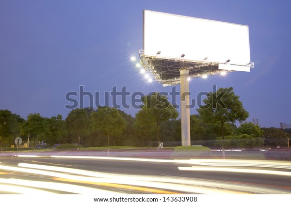 Billboard at night light
trails