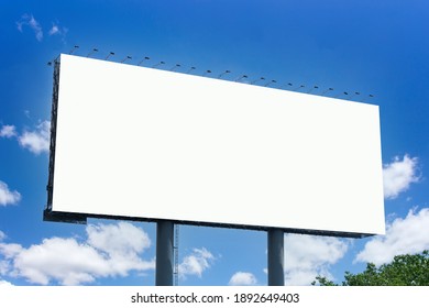 Billboard on the background of the city. Mock-up
