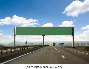 Billboard On The Highway. Skyline