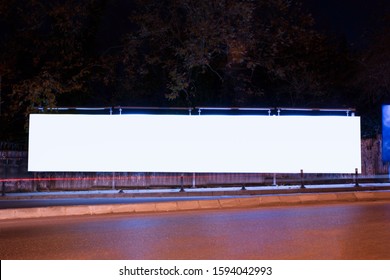 Billboard outdoor, advertising mockup, empty frame copy space for logo and text. Modern flat style signboard. Outdoor street banner night shot, long exposure.