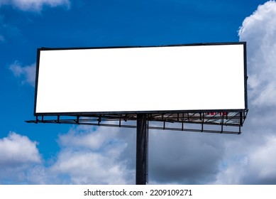 Billboard Screen Mock-up Vertical. Outdoor Mockup Promotion Poster - A Blank Billboard Against A Blue Sky