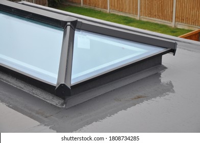 Billericay, Essex, United Kingdom, August 11, 2020. Grey Flat Roof Window Or Light / Lantern Close Up Area Of Detail. Wet Day Rain Reflections. Billericay, Essex, United Kingdom, August 11, 2020