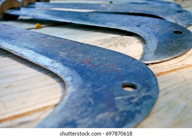 Billhook On The Wooden Table