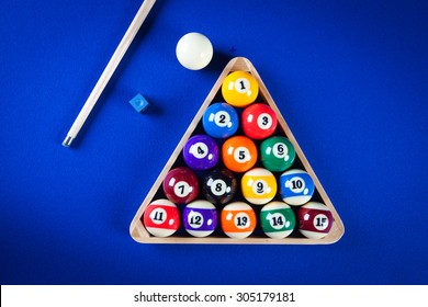 Billiard Balls In A Blue Pool Table