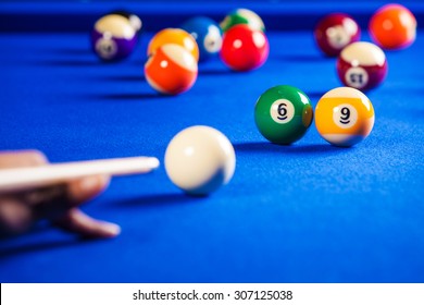 Billiard Balls In A Blue Pool Table