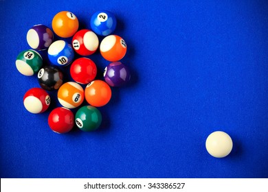 Billiard Balls In A Blue Pool Table. Horizontal Image Viewed From Above.