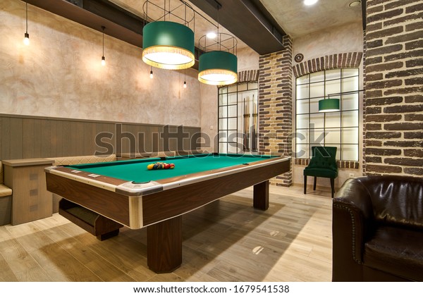 Billiard hall with a big pool table                     \
        