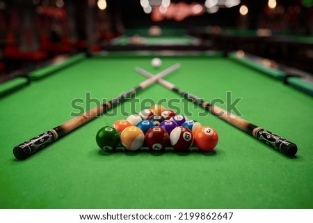 Billiard table with colorful ball