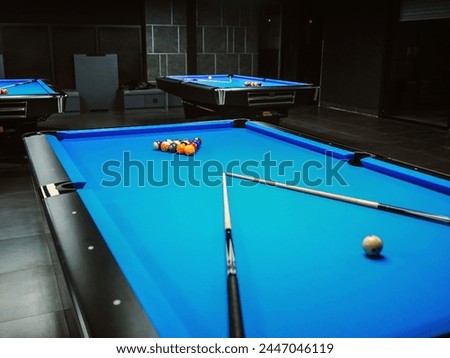 Billiard table setting with blue cloth 