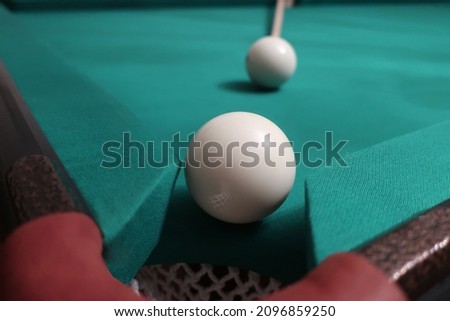 Billiards game. Billiard balls on a billiard table, sports concept.