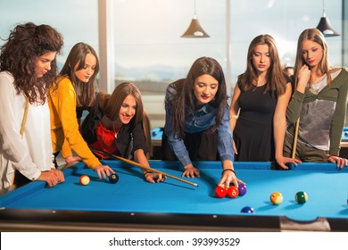 Billiards Game. Group Of Friends Playing Pool Together.