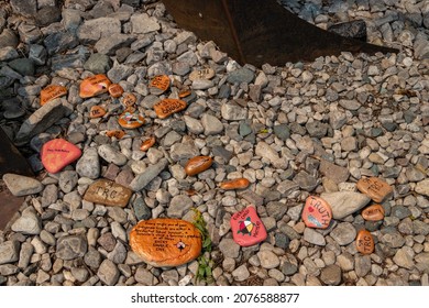 Billings, Ontario, Canada - August 3, 2021: Orange Painted Rocks Along The Kagawong River Trail To Bridal Veil Falls On Manitoulin Island.