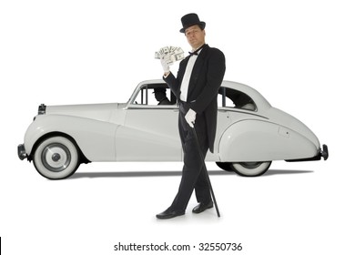 Billionaire Standing In Front Of A Vintage Car Against A White Background