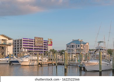 Biloxi, Mississippi, USA. 05/13/2019 Biloxi marina with the hard rock casino parking garage in background
