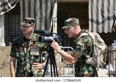 BILOXI, UNITED STATES - Sep 08, 2005: Air Force Reporter And Videographer Record Hurricane Katrina Relief Efforts.