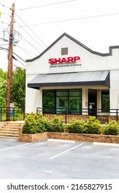 BILTMORE VILLAGE In ASHEVILLE, NC, USA-5 JUNE 2022: Sharp Business Systems, Building Facade, Sign.