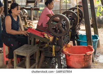 BILU ISLAND, MYANMAR - DECEMBER 11, 2018: Unidentified Workers Cut Long Rubber Tubes Into Rubber Bands At A Small Factory On Bilu Island Outside Of Mawlamyine.