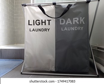 Bin And Dirty Laundry Bag For Black And White Clothes In The Bathroom