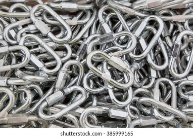 A Bin Of Stainless Steel Quick Links