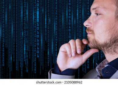 Binary code. A businessman looks at a background of digital binary code numbers. Copy space. High quality photo