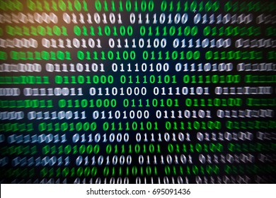 Binary code green blue digital color on black background with zoom effect for graphic design it taken by computer monitor with close up lens