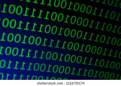 Binary code in green font on a black background, photo