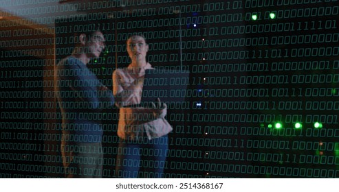 Binary code over people discussing in data center. Technology, IT, cybersecurity, network, server, communication