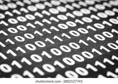 Binary code pattern on black surface for technology background
