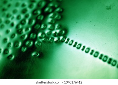 Binary code: stylistic images depicting digital language emerging from a numerical cloud with intentional focus issues