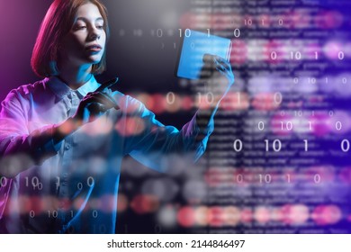 Binary codes and a girl with an electronic tablet. Digital transformation concept. Binary code. System engineer. Programming training. Programming languages. - Shutterstock ID 2144846497