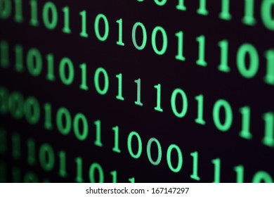 Binary computer code background, shallow DOF. - Shutterstock ID 167147297