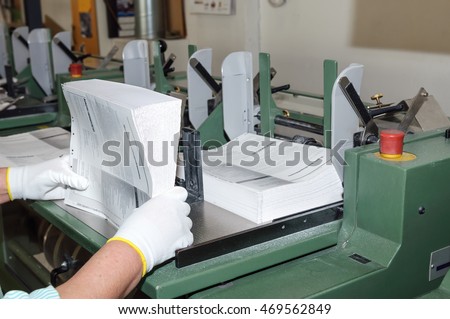 Binding of books in printing house